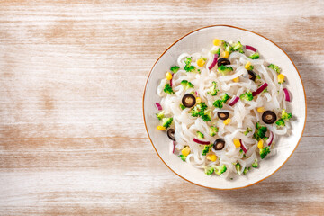 Wall Mural - Konjac pasta with broccoli, shot from above with a place for text