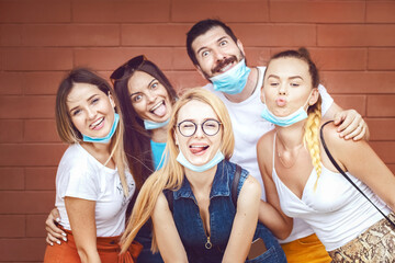 Wall Mural - Happy friends taking selfie with funny faces outdoor