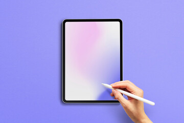 Tablet screen with design space hand holding stylus