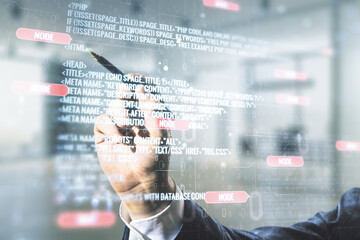 Poster - Multi exposure of businessman hand with pen working with abstract graphic coding sketch on blurred office background, big data and networking concept