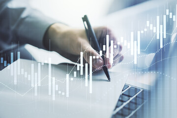 Multi exposure of abstract financial diagram with hand writing in notepad on background, banking and accounting concept