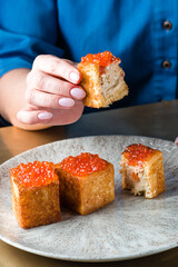 Canvas Print - toasts with red caviar, foie gras ganache and fried brioche with red caviar