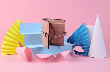 Poster - Beauty product. Leather purse on pink torn background with geometric shapes. Minmalism. Concept art