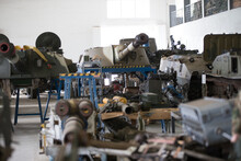 Military Factory.Warehouse Of Military Equipment. Battle Tanks In The Factory
