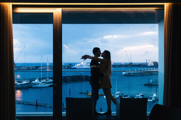 Romantic happy woman and man hugging, enjoying life and romance