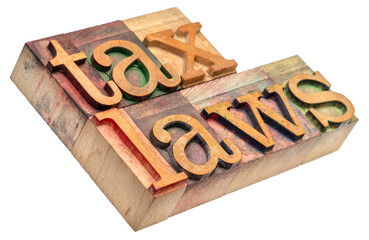 tax laws - isolated word abstract in vintage letterpress wood type, business and finance concept