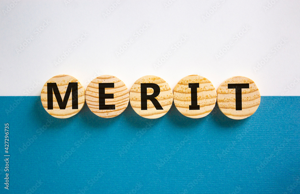 Merit Lettering Merit symbol. Wooden circles with the word 'merit'. Beautiful white and ...