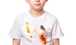 
Boy without face in dirty t-shirt from food isolated on white background