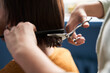 © Yakobchuk Olena - Couple having hair cut at home during quarantine coronavirus pandemic