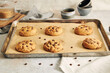 Deliciously baked cookies with chocolate chips on a baking sheet