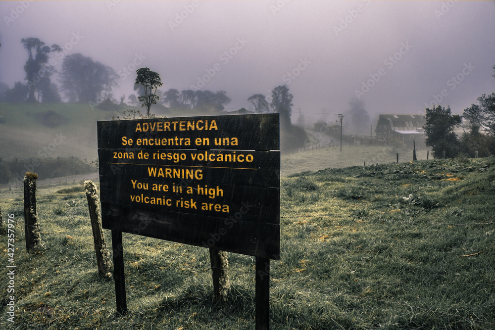 Volacnic Risk Sign Caution sign for a volcanic risk zone in the vicinity of the national ...