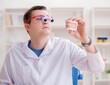 © Elnur - Dentist working teeth implant in medical lab