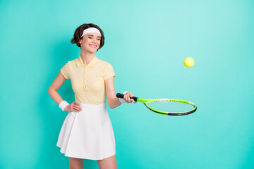 Photo of attractive charming young lady match champion tennis racket set isolated on pastel teal color background