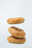 Fototapeta Mapy - Sweet donuts on a white background. Isolated sweetness on a light background. Sweet bagels