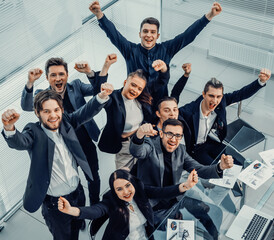 Wall Mural - happy business team at the workplace in the office.