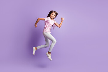 Wall Mural - Full size profile photo of optimistic nice brunette girl run wear t-shirt isolated on pastel purple color background