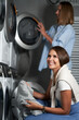 © Kalim - Two students in laundry room