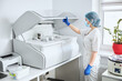 © Svitlana - Biochemist using the laboratory device for a biochemical test