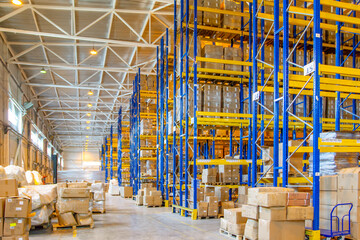 Wall Mural - Interior of a modern warehouse storage with rows and goods boxes on high shelves