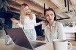 © fotofabrika - Young female boss scolding her female subordinate for bad work results