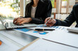 © PaeGAG - Business Team Entrepreneur discussion and analysis report chart data in office, brainstorming in Meeting and Financial advisor and accounting concept