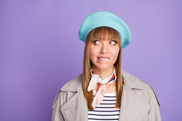 Sticker - Photo of funny tricky lady bite lip look up empty space wear blue beret scarf coat isolated violet color background