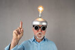 Senior businessman have a bright idea