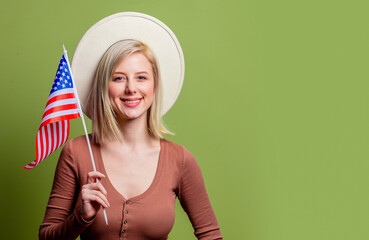 Sticker - Beautiful cowgirl in a hat with United States of America flag