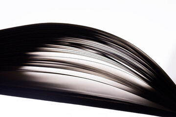 Wall Mural - abstract macro shot of  a backlit book sheets