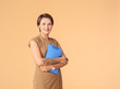 © Pixel-Shot - Portrait of female psychologist on color background