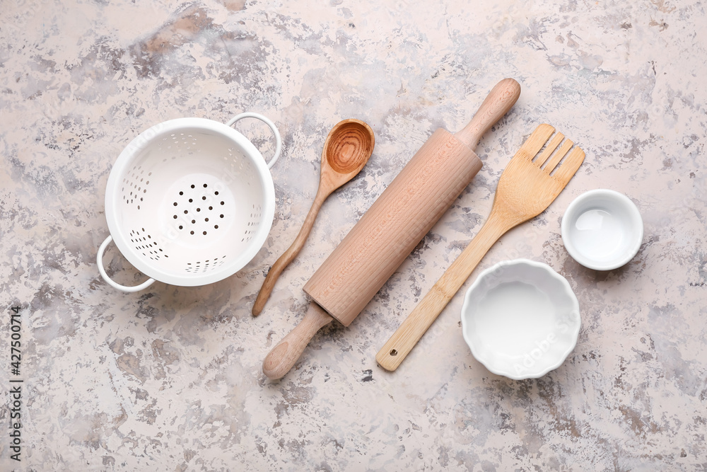 Set of kitchen utensils on light background