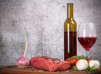 Wall Mural - red wine and beef on brown board