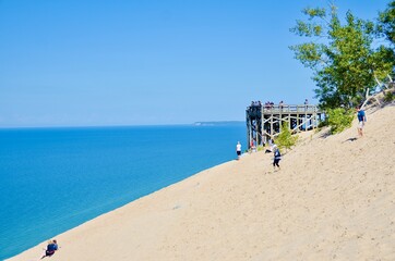 Sleeping Bear Dunes National Lakeshore, located along the northwest coast of the Lower Peninsula of Michigan .  Scenery of the dunes and lakeshore. The wooden lookout platform. 