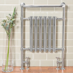 Wall Mural - Metallic heated towel rack in a modern renovated bathroom