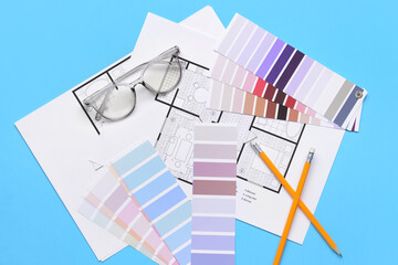 Poster - Plan of house, color samples, glasses and pencils on blue background