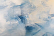 Texture materica dipinta su legno, con effetto spatolato in varie tonalità di azzurro, blu e bianco; spazio per testo
