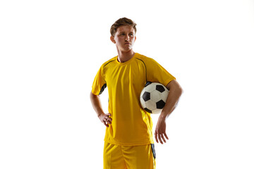 Wall Mural - Portrait of young soccer football player posing isolated on white background.