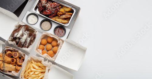 Obraz Dibond Fast food menu and snacks, delivery to customer home during COVID-19 outbreak