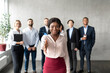 © Prostock-studio - Black Business Lady Stretching Hand For Handshake In Office