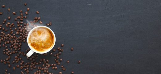 hot coffee and bean on wooden table background. mockup and templates to create greeting, cards, magazines, cover, poster and banners etc. space for text. top view. flat lay