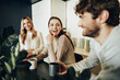© fotofabrika - Young businesspeople colleagues having a coffee break in office, drinking and talking