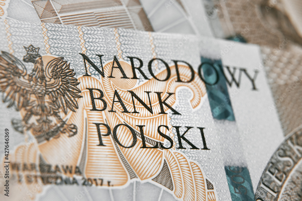 Close up on national polish bank of new Polish banknotes five hundred zloty. Macro photo of narodowy bank polski sign on PLN bill. Shallow focus. Close-up with fine and sharp texture - obrazy, fototapety, plakaty 
