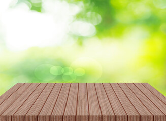 wooden table space for product Abstract natural bokeh sunlight background tree stock photo