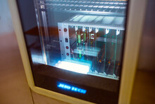 Testing Laboratory For Finished Printed Circuit Boards. Heat-cold Test Chamber With Installed Printed Circuit Boards During Testing.