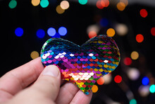 Close-up Of Hand Holding Illuminated Heart Shape