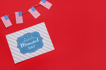 Greeting card for Memorial Day celebration with USA flags on color background