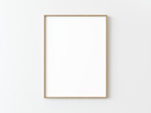 One Light Wood Thin Rectangular Vertical Frame Hanging On A White Textured Wall Mockup, Flat Lay, Top View, 3D Illustration