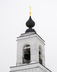 white brick bell tower of an orthodox church