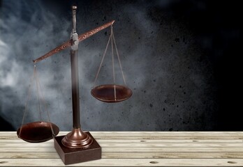 Wall Mural - Law scales on wooden table. Symbol of justice