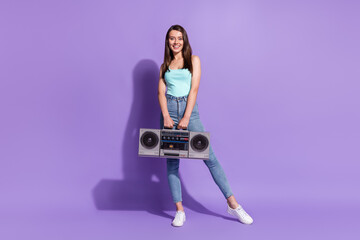 Sticker - Full length photo of charming happy lady hold boom box music lover good mood isolated on purple color background